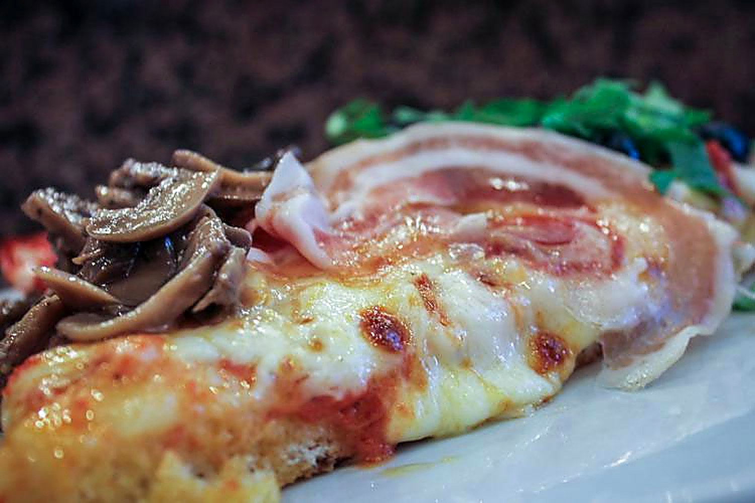 Trancio farcito con prosciutto, funghi e rucola da Giuliano
